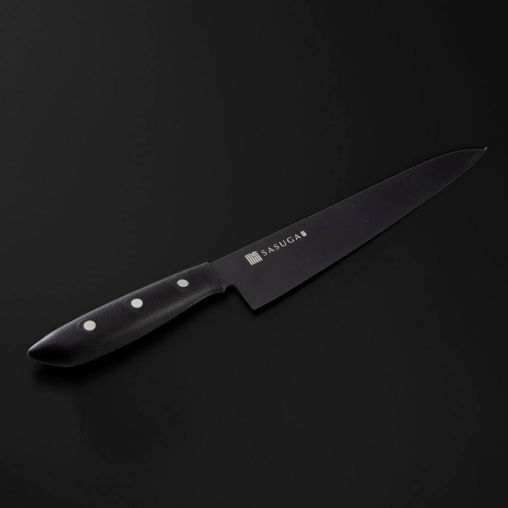 Black kitchen knife with 'SASUGA' branding on a black background