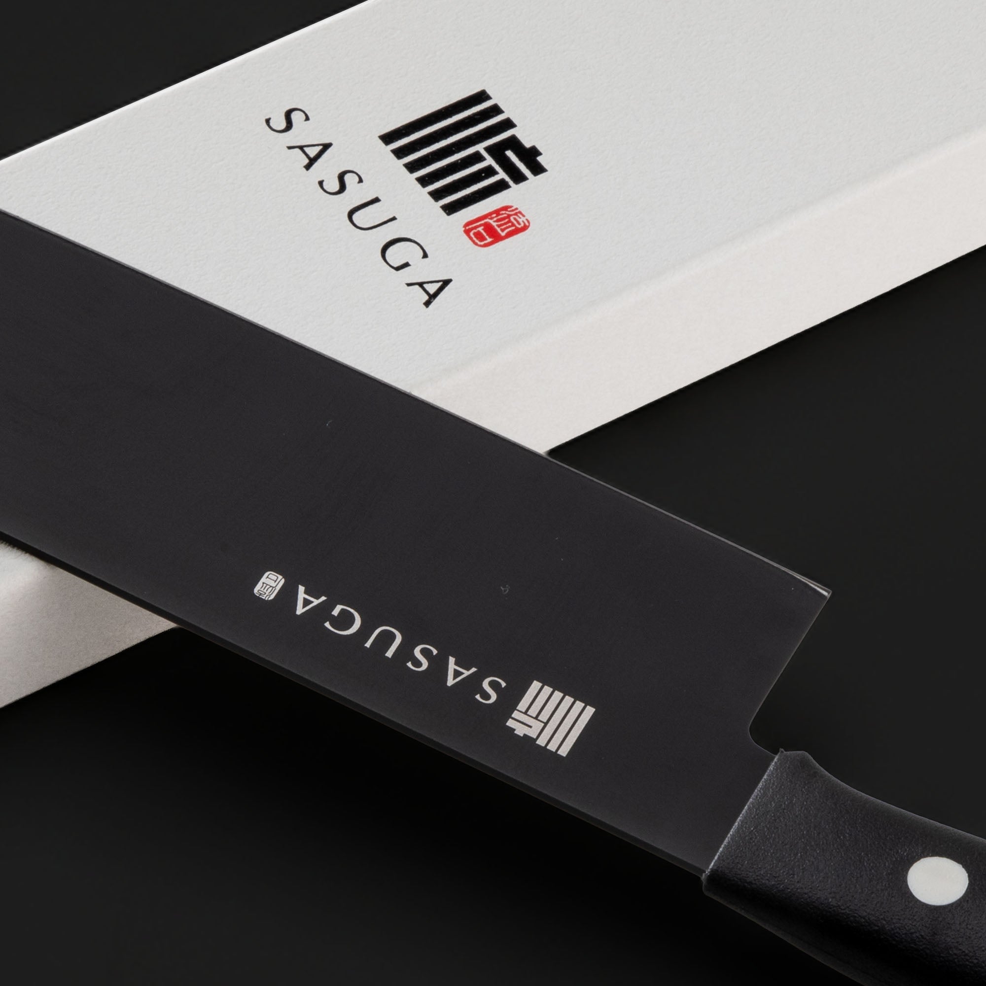 SASUGA knife with branding on a black background