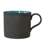 Handmade Mino-yaki ceramic mug with matte black clay exterior and deep blue glaze, made in Japan