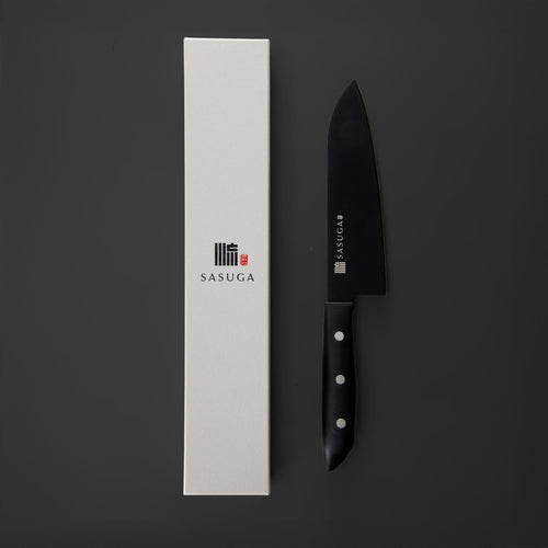 Black chef's knife with white handle next to a white box featuring the 'SASUGA' brand on a dark background.