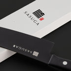 SASUGA branded knife with a black blade and white handle on a dark background