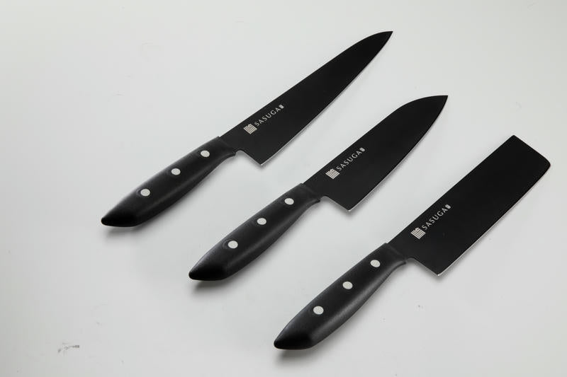 Three black knives with 'Sangac' branding on a white background